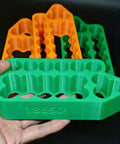 A Lightweight Battery Spot Welding Fixture That Delivers Boss Level Precision For Handling 18650 Or 21700 Lithium Cells in green PLA.