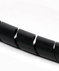 Close-up of Black Polyethylene Spiral Wrap One Quarter Inch OD Bundling Sleeve 25 Foot Spool for cables and wires