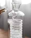 Premium Glass Cold Brew Drip Tower With Spiral Cooling Tube and Distribution Faucet features a chill ice water reservoir for iced coffee.
