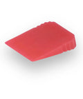 Red wedge from Precision Tile Wedges Set 450 Pack With Built In Gripper For Easy Removal leveling tiles in tub and wall installations