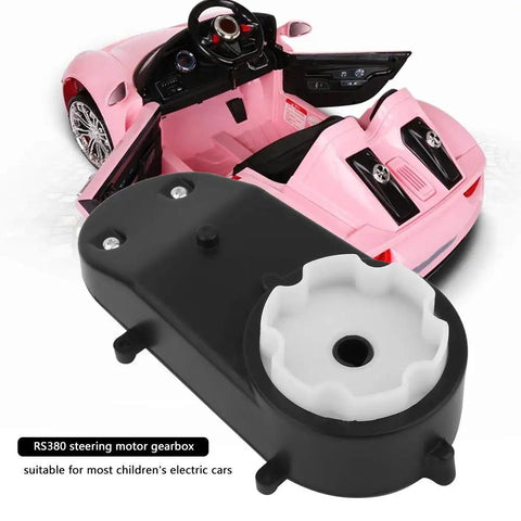 12V Kids Electric Car Steering Gear Box Replacement 5000RPM High Torque Gearbox Motor for toy cars next to pink ride-on car