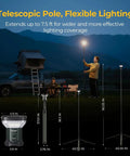 Telescoping Camping Light With 3200 Lumens LED Lantern extended 7.55 ft tall next to camping setup at night outdoors
