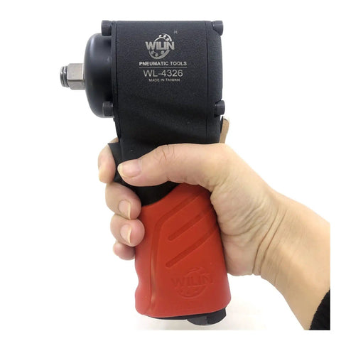 Workhorse Grade Pneumatic Air Impact Wrench Half Inch Drive Twin Hammer Design with ergonomic grip held in hand.