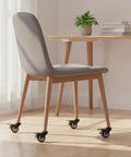 Dining chair with Easy Install Plate Caster With Brake Swivel Nylon Wheel For Smooth Furniture Mobility Ideal For Workbenches Storage Carts Cabinets And DIY Projects 1 Pack on each leg
