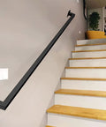 Matte Black Industrial Pipe Stair Handrail Crafted For Indoor And Outdoor Use Featuring A Super Heavy Duty Galvanized Steel Build on staircase.