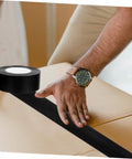 Heavy Duty Leak Stop Tape Outdoor Sealing Tape Double Sided Waterproof For Water Pipes Extra Wide Patch Kit being applied on a box
