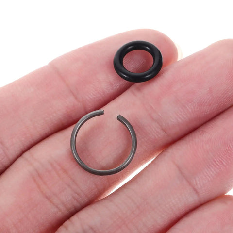 Close-up of iron retaining ring and rubber O ring, part of 12-piece set, Heavy Duty Impact Wrench Retaining Ring Clips With O Rings.