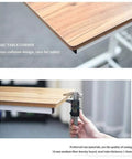 Close-up of No Stress Rolling Laptop Desk And Mobile Workstation Stand Adjustable Tilt Table corner with anti-collision design.