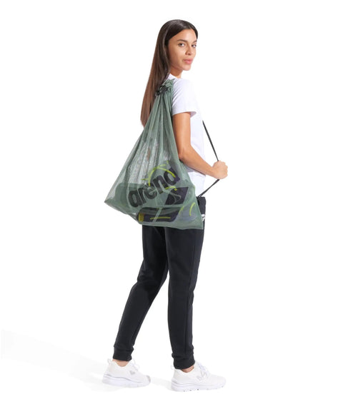 Mesh Pool Gear Sack For Swim Team Practice Quick Dry Tote Bag with Drawstring Closure worn by woman, Sage Green color.