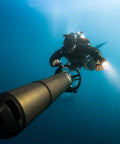 Diver holding DL46 Dive Light 20000 Lumen Scuba Flashlight with Type C Rechargeable Battery, underwater exploration
