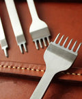 Leather Craft Hole Punch Set With 1, 2, 4, 6 Prongs For Lacing And Stitching 4mm Punches Carbon Steel Tools on leather surface