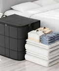 Roomy Large Capacity Moving Storage Bag With Smooth Clip Zipper And Foldable Build Heavy Duty Canvas Tote holding bedding and clothing.
