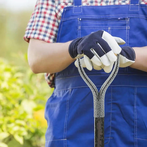 Gardener holding D Grip Shovel Handle Replacement With 32mm Inner Diameter Metal Core And Wooden Grip in blue overalls.