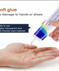 Waterproof Quick Dry Super Strong Shoe Glue For Sneakers Boots Sandals And Hiking Shoes Multi Purpose Adhesive For Fast Repairs Clear Formula With Precision Needle Tip Easy Application One Pack Sticks Like Crazy being applied to a hand with precision needle tip.