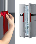 Person fitting big red Velcro refrigerator handle cover, shown on modern fridge. Five Piece Velcro Refrigerator Door Handle Covers In Big Red Easy Adjustments Keeps Your Kitchen Handles Clean From Smudges Fingerprints Drips And Food Stains Perfect For Dishwashers And All Major Appliances.
