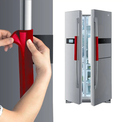 Person fitting big red Velcro refrigerator handle cover, shown on modern fridge. Five Piece Velcro Refrigerator Door Handle Covers In Big Red Easy Adjustments Keeps Your Kitchen Handles Clean From Smudges Fingerprints Drips And Food Stains Perfect For Dishwashers And All Major Appliances.