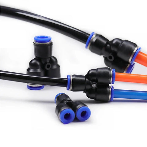Super Cool 100 Piece Pneumatic Fittings Kit Push To Connect Air Hose Adapters For Quick Assembly With Adjustable Size Port And Elegant Black Finish Fit Perfectly For Compressors And Industrial Tools. black push-to-connect pneumatic fittings with blue rings for air tubing