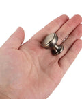 4 Pack Brushed Zinc Alloy Cabinet Pulls Single Hole Drawer Handles in a hand, showcasing solid build and design.