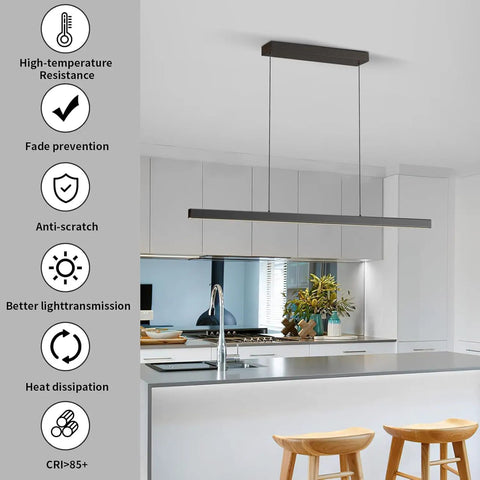 Zihoi Modern Ceiling Pendant Light,31.5in LED Black Linear Ceiling Chandelier Light Dining Room,Living Room, suspended above a kitchen island.