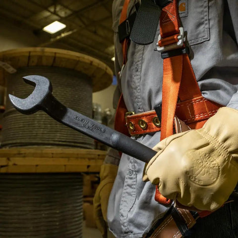 Worker holding Spud Wrench for 5/8 Inch Bolts and US Heavy Nuts, Heavy-Duty Alloy Steel Construction, 1-1/16 Inch Opening