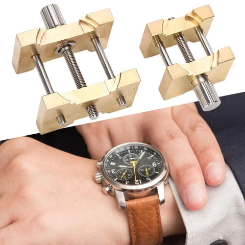 Copper Watch Movement Hold Tool For 4040 And 4039 Movements dual-sided holder next to a wristwatch for quick battery swaps.
