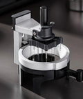 Heavy Hitter Rotary Espresso Puck Distributor Tool Featuring Adjustable Height And 12 Precision Points To Crush Clumps Level Coffee Grounds Evenly Compact Barista Accessory For Home Daily Driver Setup on a flat surface.