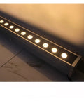 Heavy Duty Aluminum Wall Washer Architectural Accent Flood Light With Smooth Dimming For Interior Exterior Building And Studio Pro Level Slick Rock Solid Design Emitting Vibrant Red And Warm White 3000k illuminated on a wall.