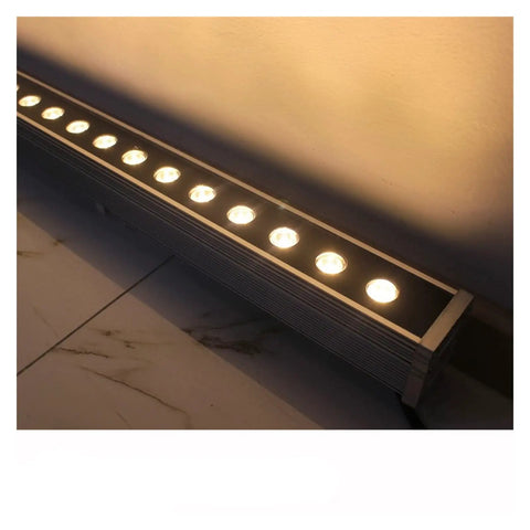 Heavy Duty Dimmable Led Wall Washer Floodlight Featuring Rock Solid Aluminum Build And Scratch Proof Glass For Stunning Indoor Outdoor Lighting And Lowkey Epic Studio Vibes, viewed from the side with multiple bright LEDs.