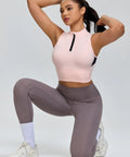 Model wearing Cropped Workout Tank For Women With Built In Bra Half Zip High Neck Sports Top with Chintz Rose color, kneeling pose