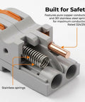 Close-up of Double Wire Push In Terminal Connectors Kit No Fuss Fire Resistant Lever Lock Wire Connectors, showing copper and springs.