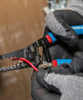 Gloved hands using Curve Wire Stripper And Cutter For 6-12 AWG Stranded Wire, 7-1/8 Inch Hand Tool with open serrated jaws.