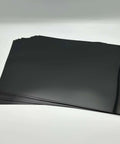 Stack of black opaque PET stencil sheets, 12x12 inches, 7.5 mil, for Cricut and laser cutting