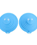 Two blue SUNGOOYUE Silicone Tub Stoppers with playful faces, round design, made from durable silicone material.