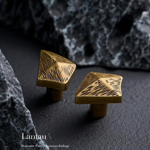 Antique Bronze Cabinet Knobs And Drawer Pulls Two Pack With Boho Geometric Silhouettes on dark surface with textured design