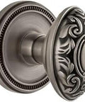 Soleil Rosette Double Dummy Door Handle Set With Grande Victorian Knob in Antique Pewter Solid Forged Brass Construction, side view.