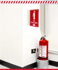 24 Pack Fire Extinguisher Signs 6.3 Inch By 6.3 Inch Durable Acrylic Warning Signs With Pre Drilled Holes Down Arrow Includes Screws And Adhesive Tape For Home Office And Biz Safety installed on wall above extinguisher