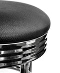 Close-up of Heavy Duty 30 Inch Backless Swivel Bar Stool With Chrome Finish And Faux Leather Seat For Kitchen Garage Or Workshop, Black