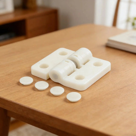 Adjustable Plastic Resin Gate Hinges With 90 And 180 Degree Stop for outdoor gates on a table, white finish.