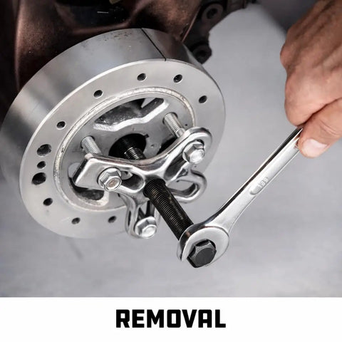 Using Harmonic Balancer Puller And Installer Tool Set For Cars And Light Trucks with threaded holes for engine component removal.