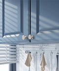 Installed 10 Pack Brushed Satin Nickel Cabinet Knobs 1.2 Inch Round Drawer Knobs on blue kitchen cabinets