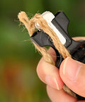 Close-up of 5 In 1 Paracord Survival Bracelet with Compass Fire Starter Whistle Glass Breaker and Paracord for Camping Hiking.