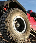 Beefy Manual Locking Hub With 19 Splines And 1 Pair For OEM Replacement visible on 4x4 off-road vehicle, showing precision cast hub.