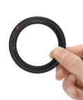 Hand holding SV195 Wide 48mm T Ring Adapter For Canon EOS Cameras No Fuss Easy To Use Prime Focus Or Eyepiece Projection