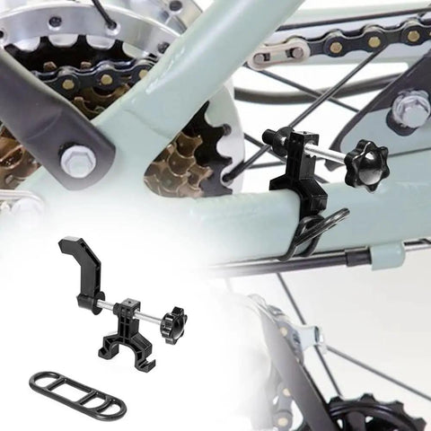 Ultra Portable Bike Wheel Truing Stand For On The Go Rim Adjustment attached to bike frame, lightweight and black