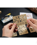 Bravery Mechanical DIY Kit Wooden 3D Puzzle 45 Piece Fidget Gear Toy For Mindful Builders Do It Yourself Brain Teaser STEM Gift For Kids And Adults Hands On Construction Next Level Fun For The Family wooden parts held by hand
