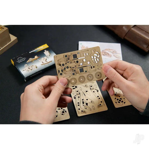 Bravery Mechanical DIY Kit Wooden 3D Puzzle 45 Piece Fidget Gear Toy For Mindful Builders Do It Yourself Brain Teaser STEM Gift For Kids And Adults Hands On Construction Next Level Fun For The Family wooden parts held by hand