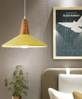 KCEYANB Adjustable Height Pendant Light Modern Simplicity Metal Hanging Lamp with yellow shade and wooden accent in a modern interior.