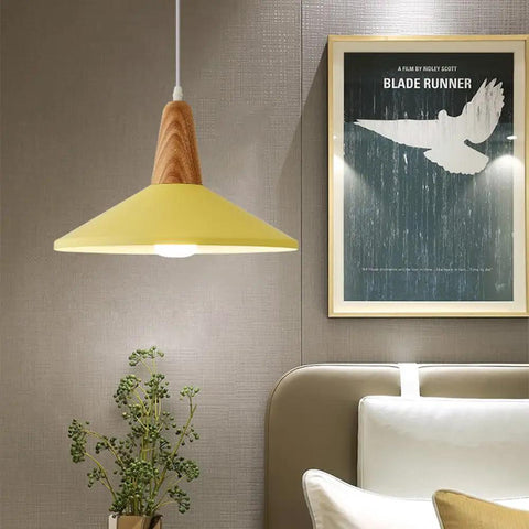 KCEYANB Adjustable Height Pendant Light Modern Simplicity Metal Hanging Lamp with yellow shade and wooden accent in a modern interior.
