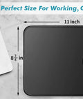 11 X 8.7 Inch Mouse Pad With Stitched Edges And Non Slip Base For Slick, Smooth Tracking On A Clean Desk At Home Or Office Durably Built Cloth Surface Low Friction Stable Easy Glide Computer Mouse Pad next to laptop and mouse.