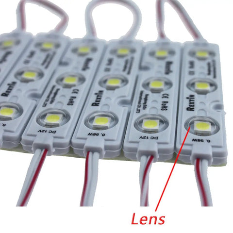 Super Bright 200 Pack 3 LED 5050 SMD Modules White Waterproof Peel And Stick Sign Lighting For Letter Signs And Advertising Displays 66 To 72LM Per Module Easy Low Power, close-up with lens, wires shown.